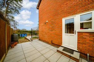 SIDE PAVED AREA- click for photo gallery